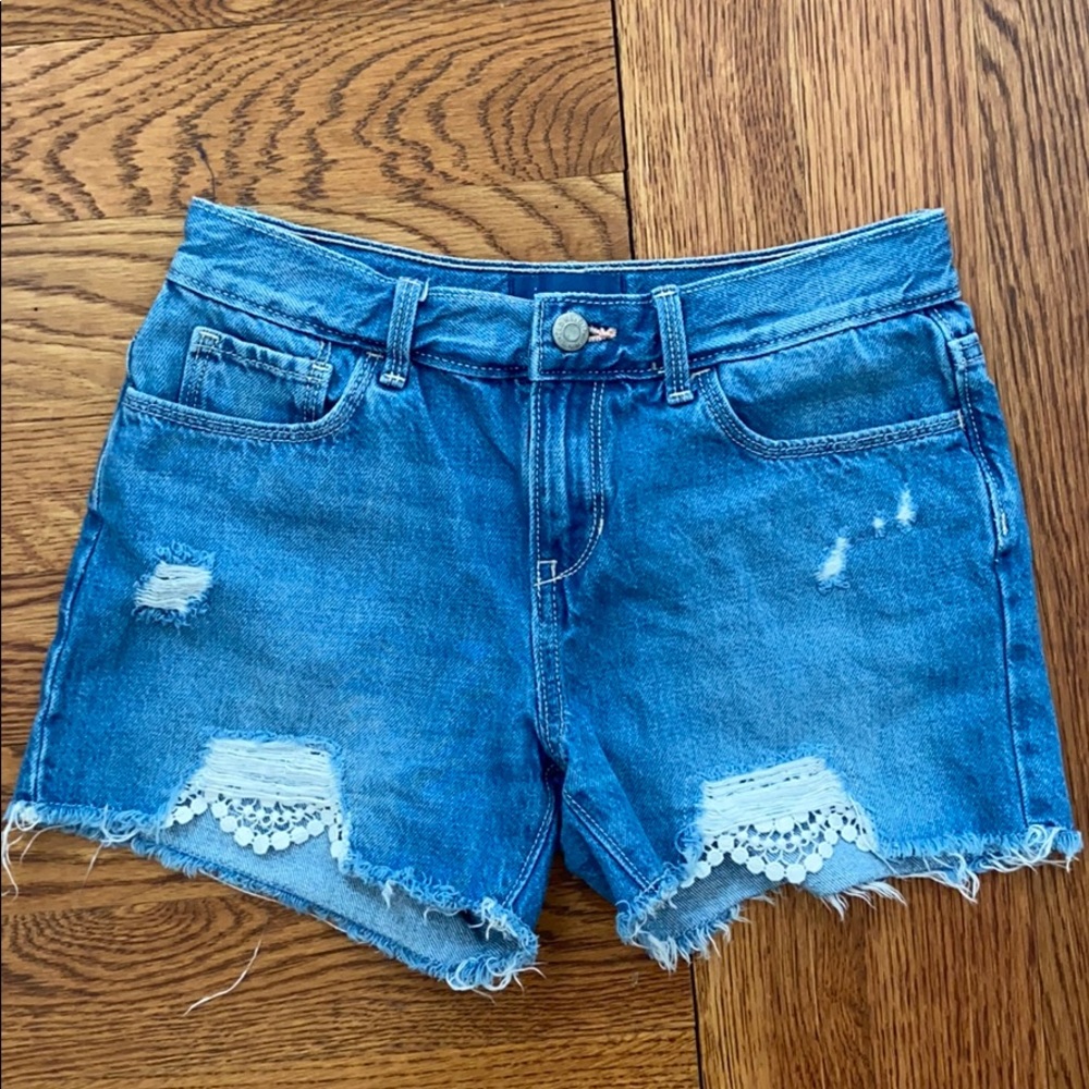Girls Size 14 Old Navy denim shorts with lace/rips